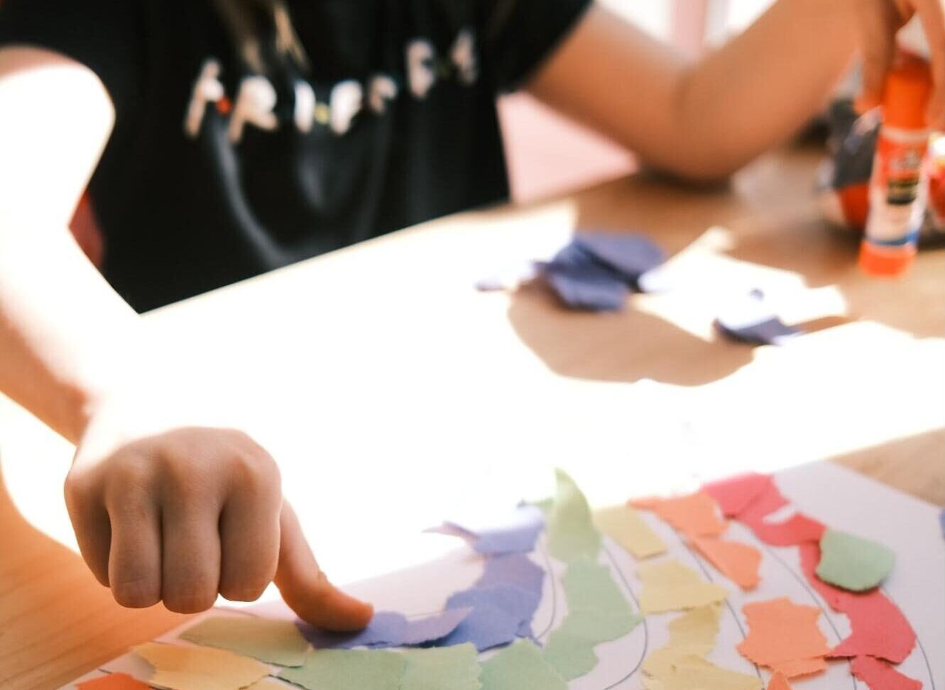 cutting and pasting paper on a sheet will help your kids fine motor skills