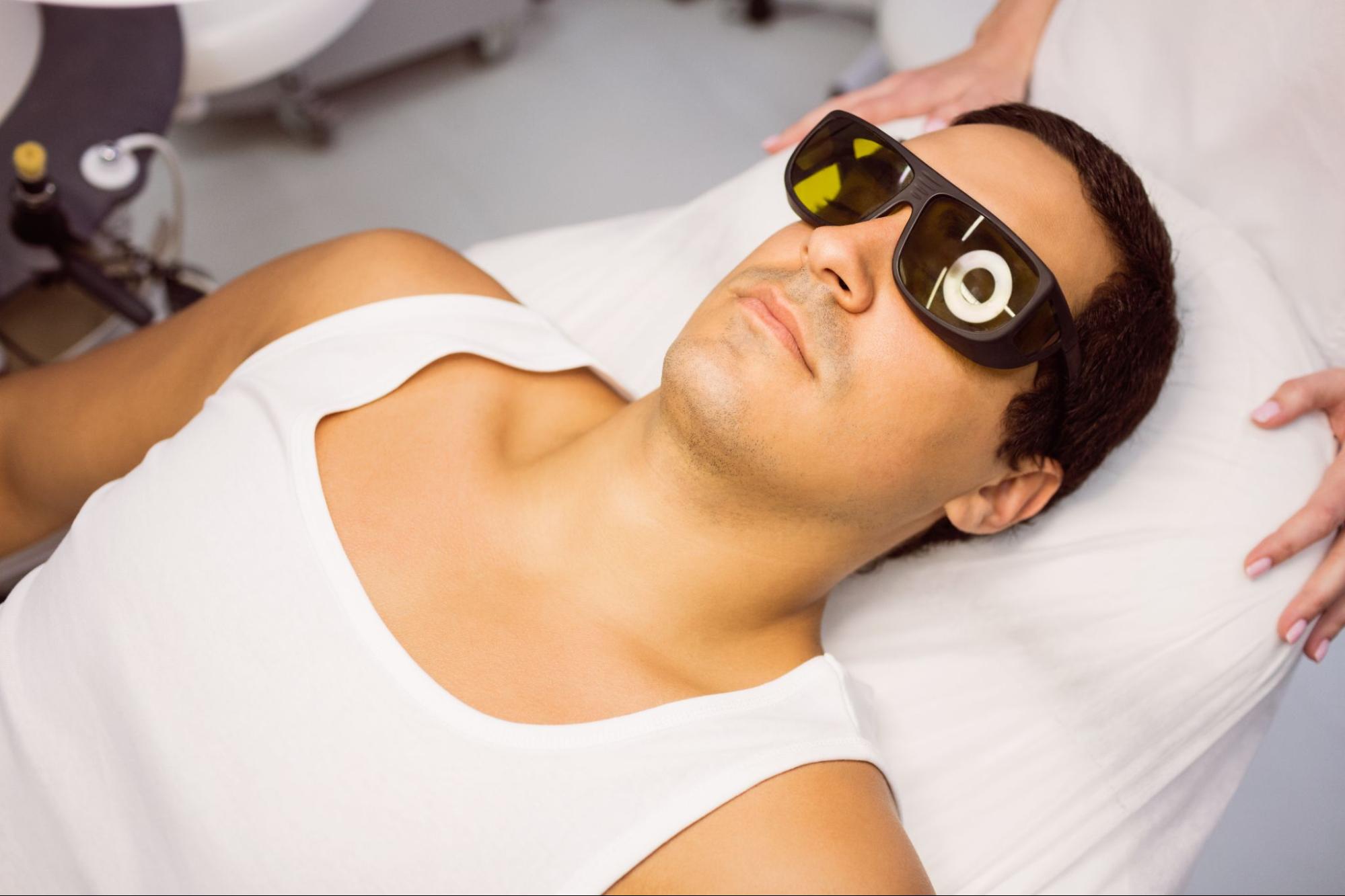 Protective eyewear for laser therapy