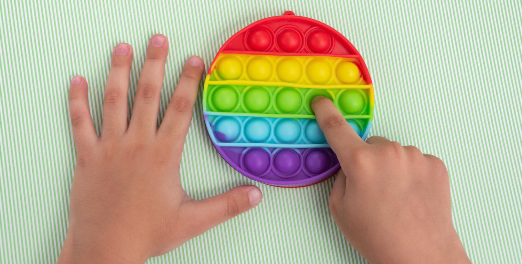Bilateral hand coordination means that a kid is able to use both hands at the same time